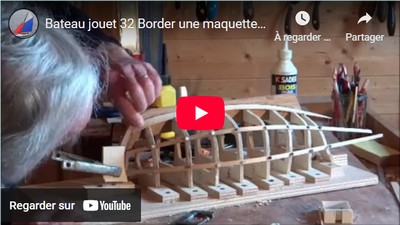 Border une maquette de canot à franc bord: